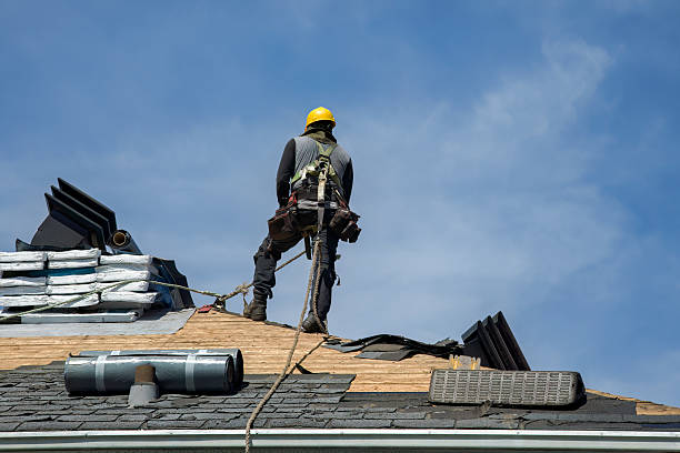 Professional Roof Replacement technician working in Udell, IA